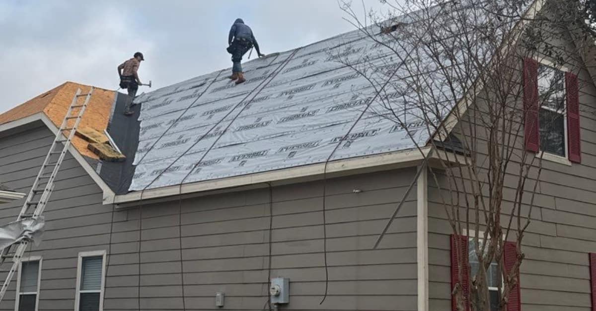 Residential roof replacement by DFW Roofers in Mckinney, Texas, highlighting employees working