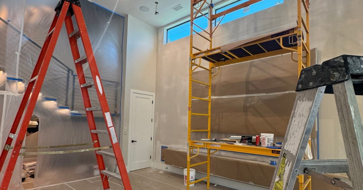 Interior painting job by DFW Roofers in Frisco, Texas, highlighting work process