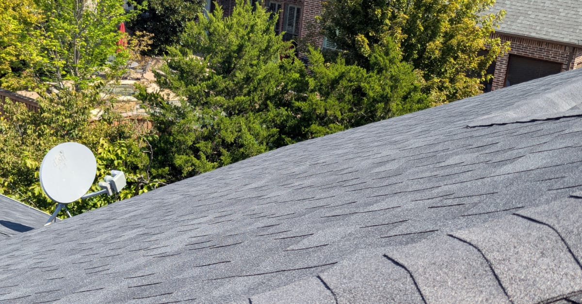 Residential roof replacement by DFW Roofers in Highland Village, Texas highlighting sealant protection